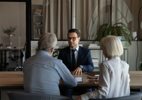 Family lawyer discussing case with his client