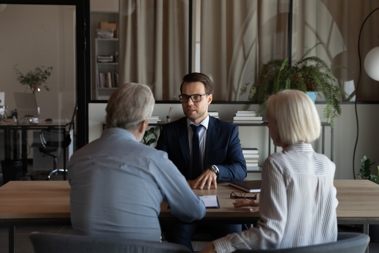 Family lawyer discussing case with his client