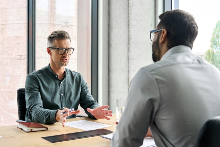 Lawyer discussing family law case with his client