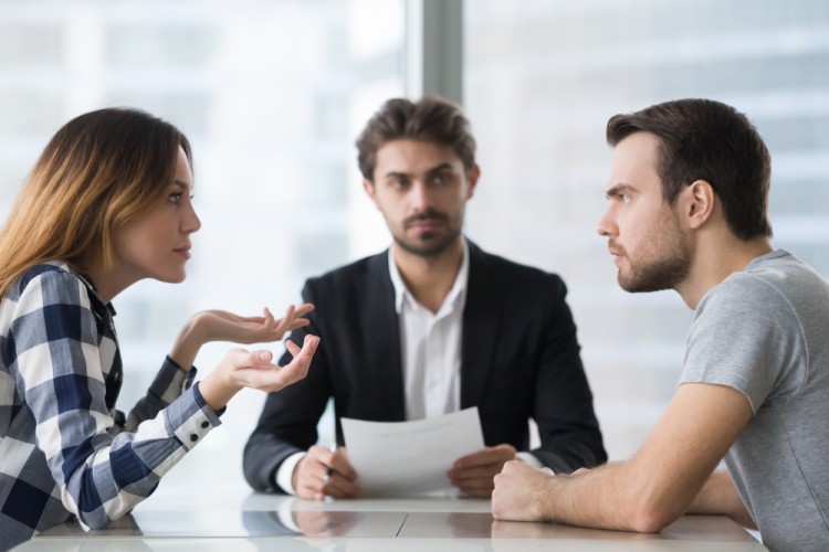 Divorce couple with a family lawyer