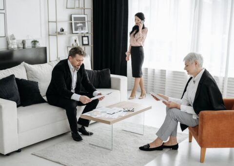 Lawyer negotiating property settlement and consent orders with a client