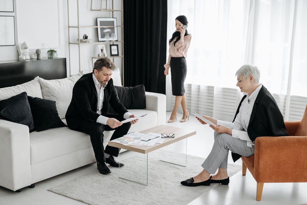 Lawyer negotiating property settlement and consent orders with a client